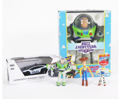 Toy Story Disney by Think Way Buzz Lightyear (boxed) together with other Toy Story figures and CMJ RC Cars 1:24 Lamborghini A