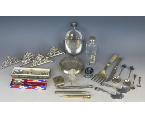 A Victorian silver menu holder maker William Hutton &amp; Sons Ltd, London, 1894, of arched foliate design together with thre