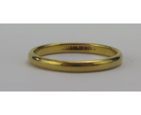 A 22ct Gold Plain Wedding Band, 2.23g wide, size M, stamped 22CT SOLID GOLD, 2.33g