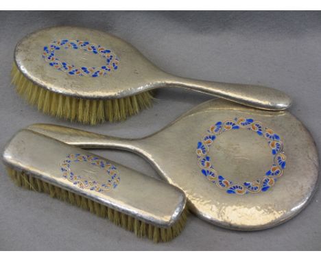 LIBERTY &amp; CO SILVER &amp; ENAMEL THREE PIECE DRESSING TABLE SET - hand mirror and two brushes, Birmingham 1925 - 7, numbe