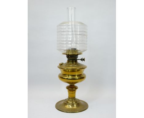 VICTORIAN BRASS OIL LAMP - with clear glass ribbed shade, the wick turners marked 'British Made', 56cms overall H including f
