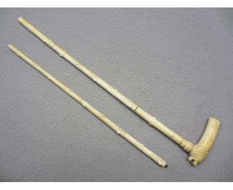 ANGLO INDIAN CARVED IVORY WALKING STICK CIRCA 1900 in the form of an open mouthed lion's mask to the handle, the sectional sh