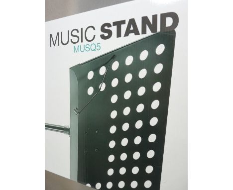 *MUSIC SHOP STOCK - a mixed quantity of boxed and loose music speaker and microphone stands with a quantity of wall mounted s