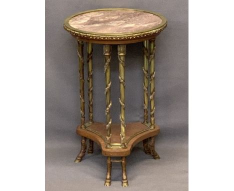 FRENCH EMPIRE STYLE GUERIDON - with pink marble top, fully bordered in brass with applied acanthus leaf decoration over three