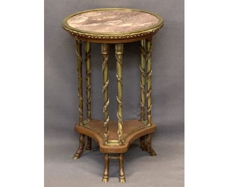 FRENCH EMPIRE STYLE GUERIDON - with pink marble top, fully bordered in brass with applied acanthus leaf decoration over three