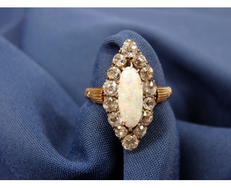 OPAL &amp; DIAMOND SET MARQUISE SHAPE RING - untested but believed 15ct gold, late 19th/early 20th century with central opal 