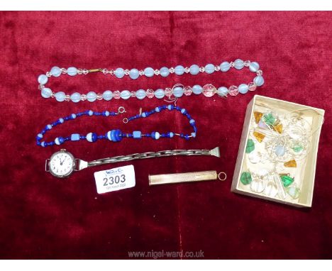 A 925 silver Swiss made wristwatch with expanding white metal strap (a/f), a small quantity of beads, a teardrop shaped opal 