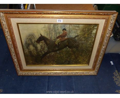 A framed over varnished print on canvas titled 'The Hunter', after A.J. Munnings, 29 1/4" x 23 1/2".
