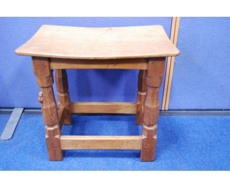 Robert 'Mouseman' Thompson carved oak stool with octagonal legs and uniting stretchers, 37cm high, 41cm wide and 28cm deep.