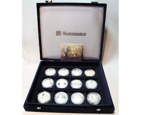 Twelve silver five pound coins.   Condition Report  A leaflet describes one Trafalgar coin.  Some are different, all refer to