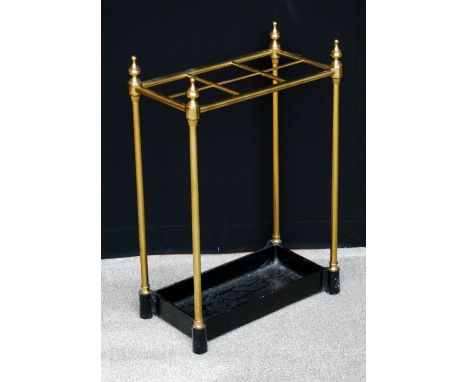 Victorian tubular brass six-division stick stand with knopped finials, 61cm high.