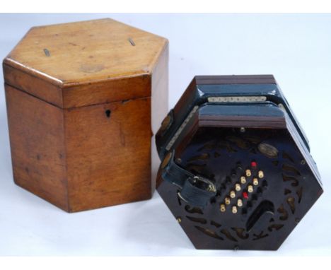 Lachenal rosewood forty-eight button hexagonal concertina, with paper label, no. 25477, 16cm diameter, in a mahogany box.