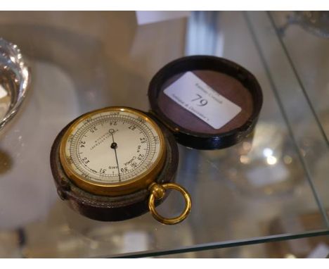 A 19th century pocket barometer, the dial signed Pollock & Stewart, Glasgow, mounted in gilt metal, in its original fitted le
