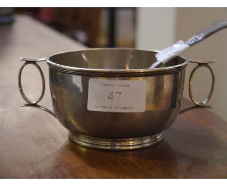 A George V silver twin-handled porringer, Sheffield 1911, engraved with presentation inscription; together with a George IV s