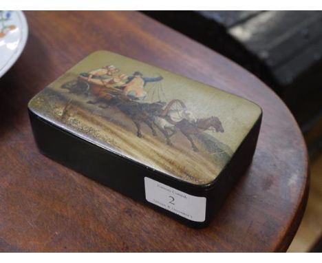 A Russian papier mache snuff box, Lukutin, Moscow, late 19th century, of rectangular form, the cover painted with figures in 