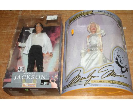 A boxed Marilyn Monroe collectors series Silver Sizzle Marilyn figure, and a boxed Michael Jackson figure