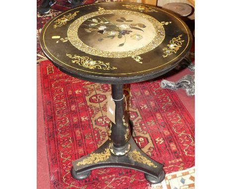 *A Victorian black lacquered, gilt decorated and mother of pearl inset papier-mache circular tilt-top pedestal tripod occasio