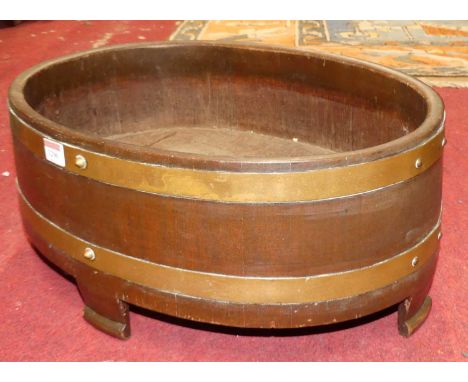 A 19th century mahogany and brass bound oval squat planter, width 54cm