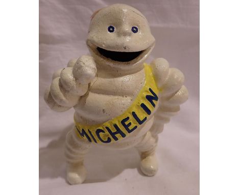 Cast iron Michelin money box, H: 16 cm. P&amp;P Group 1 (£14+VAT for the first lot and £1+VAT for subsequent lots) 