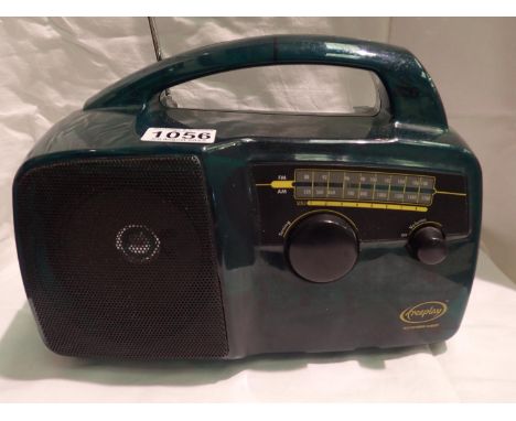 Transparent green Freeplay wind up FM/AM radio, working at lotting. Group 1 (£14+VAT for the first lot and £1+VAT for subsequ