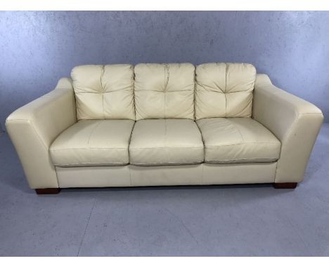 Contemporary cream leather three-seater sofa, approx 200cm in length