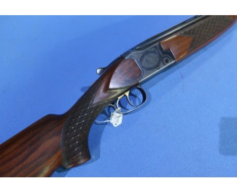 Laurona 12 bore over and under shotgun with 28 inch barrels and 15 inch pistol grip stock, serial no. 59961 (shotgun certific