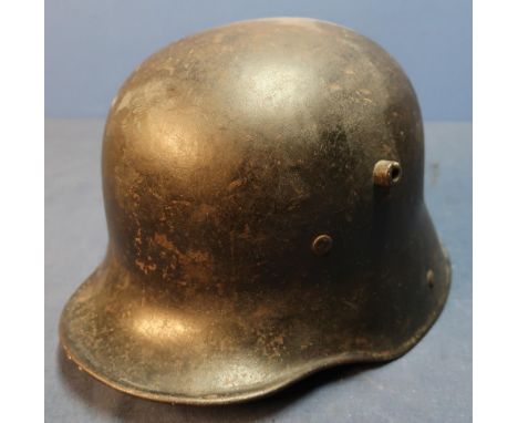 German WWI steel helmet complete with leather liner and padding 