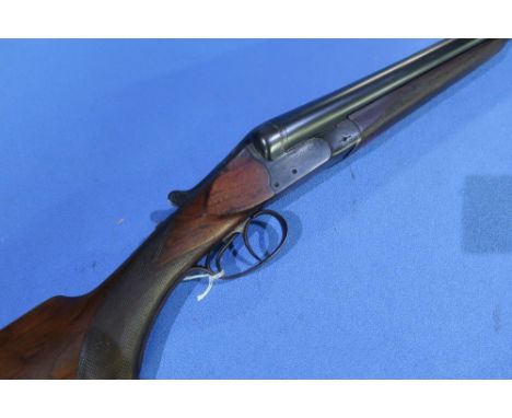 Fabrique Nationale 12 bore side by side pigeon shotgun with 27 1/2 inch barrels, choke 3/4 and 5/8, 14 inch pistol grip stock