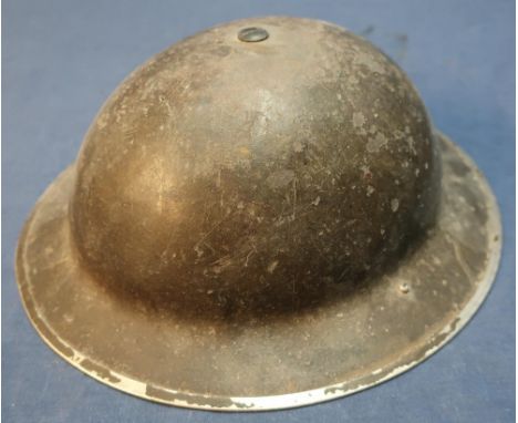 WWI British military steel helmet complete with liner and chin strap stamped MM 1939 