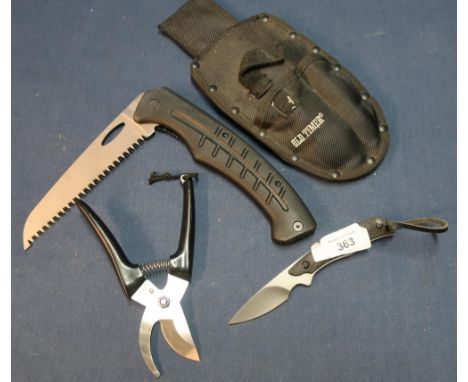 Old Timer Multi-tool belt pouch comprising of cutters, 2 1/4 inch bladed knife and 6 inch bladed saw 