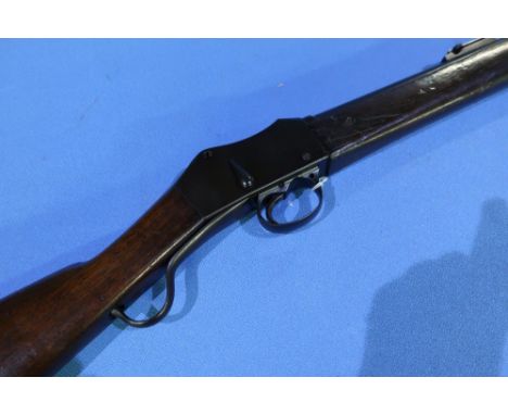 Martini action 20 bore underlever twin banded service rifle complete with cleaning rod side bayonet lugg and rear ladder sigh