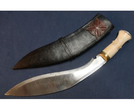 Nepalese Gurkha Kukri with bone hilt and alloy pommel cap, complete with leather scabbard  with floral top motif 