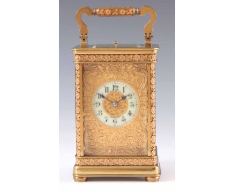 A LARGE LATE 19TH CENTURY FRENCH REPEATING CARRIAGE CLOCK the brass case with applied gilt floral decoration inset with bevel