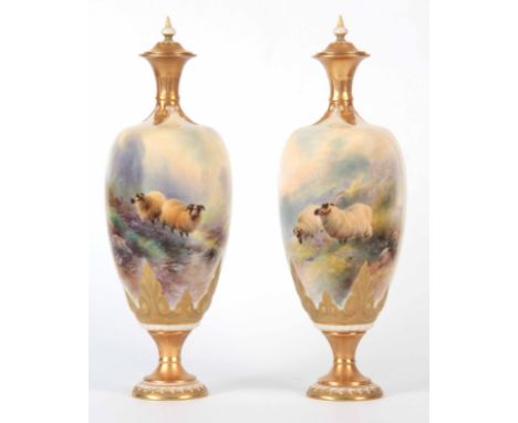 HARRY DAVIS, A FINE PAIR OF ROYAL WORCESTER CABINET VASES of ovoid form with a flared neck, having a gilt lid and ring foot; 