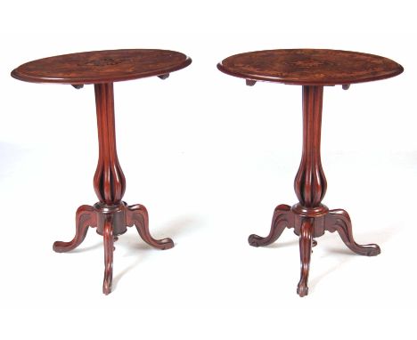 A NEAR PAIR OF VICTORIAN MARQUETRY INLAID BURR WALNUT OCCASIONAL TABLES with oval tops decorated with flower heads; standing 