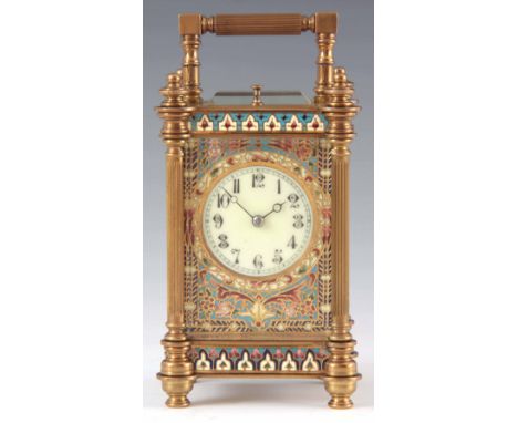 A LATE 19TH CENTURY FRENCH CHAMPLEVE ENAMEL REPEATING CARRIAGE CLOCK the brass case with reeded columns and champleve decorat
