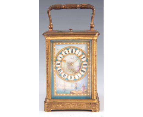 A FINE 19TH CENTURY FRENCH 'SEVRES' PORCELAIN PANELLED ENGRAVED CARRIAGE CLOCK the gilt brass fully engraved corniche case in