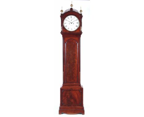 WILLIAM WEBBER, POWIS STREET, WOOLWICH. A LATE GEORGE III FLAMED MAHOGANY ROUND DIAL LONGCASE CLOCK with a 12” painted dial h