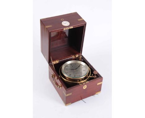 THOMAS MERCER, MAKER TO THE ADMIRALTY, ST ALBANS, NO. 1295N. AN EIGHT-DAY MARINE CHRONOMETER having a brass bound three-tier 