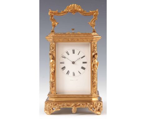 BOLVILLER, A PARIS. A LARGE MID 19TH CENTURY FRENCH REPEATING CARRIAGE CLOCK the ornate brass case with caryatid corners inse