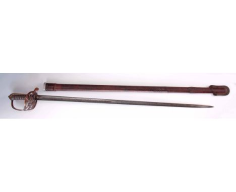 A LATE 19TH CENTURY INFANTRY OFFICERS SWORD BY HENRY WILKINSON, PALL MALL, LONDON having an etched single edged blade with fo