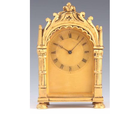 VINER, LONDON. A LATE REGENCY GILT BRONZE CASED CARRIAGE STYLE MANTEL CLOCK the ornate arched case with column sides enclosin
