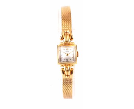 A LADIES 18CT GOLD EBEL WRIST WATCH on an 18ct gold bracelet, the square case with domed glass lens enclosing a silvered dial