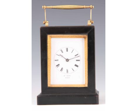 HENRY MARC, PARIS. A MID 19TH CENTURY FRENCH EBONISED CARRIAGE CLOCK the wooden case with brass rolling pin style handle and 