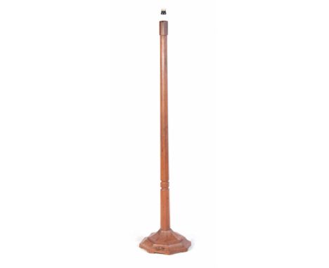 A ROBERT 'MOUSEMAN' THOMPSON OAK STANDARD LAMP with stepped hexagonal base 144cm high.