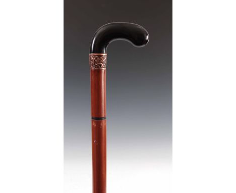 AN EARLY 20th CENTURY GENTLEMANS HORN HANDLED MALACCA SWORD STICK having a 61.5cm etched steel triangular sectioned tapering 