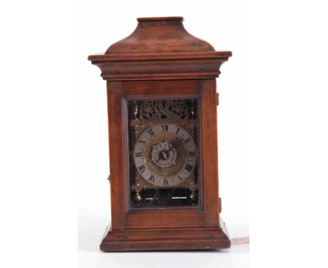 A MINIATURE BRASS CASED LANTERN CLOCK of typical form with steel bell supported by brass straps above 3.5" silvered engraved 