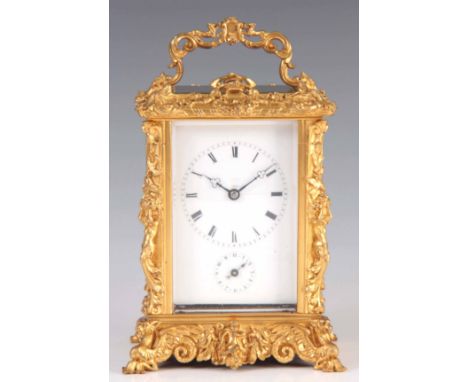 HOLINGUE FRERES, PARIS. A 19TH CENTURY FRENCH GILT BRASS REPEATING CARRIAGE CLOCK the heavy repoussé case enclosing a 2.5" po