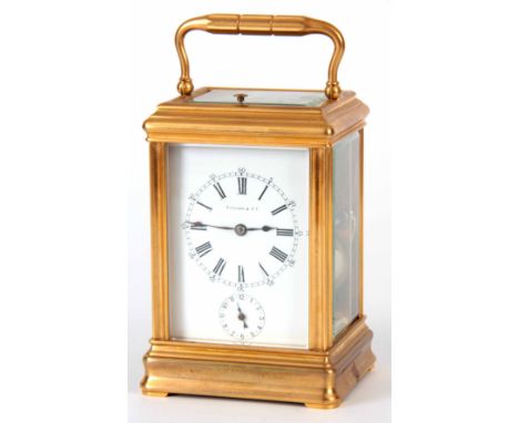 DROCOURT. A 19TH CENTURY FRENCH GORGE CASED GRAND SONNERIE CARRIAGE CLOCK RETAILED BY TIFFANY &amp; CO. the brass moulded cas