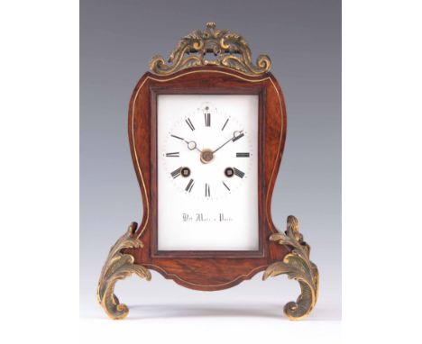 A 19TH CENTURY FRENCH ROSEWOOD MANTEL CLOCK the case supported on gilt brass acanthus leaf feet with brass string inlay surmo